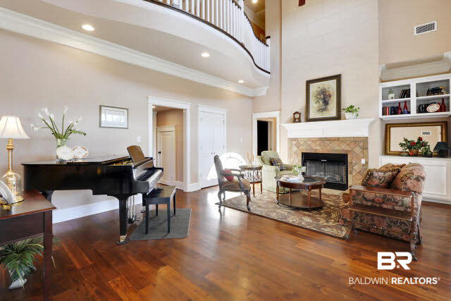 17140 Davis Road Summerdale, AL 36580 - Photo 16 of 33 Large den with fire place. Beautiful French doors lead out to the porch.
