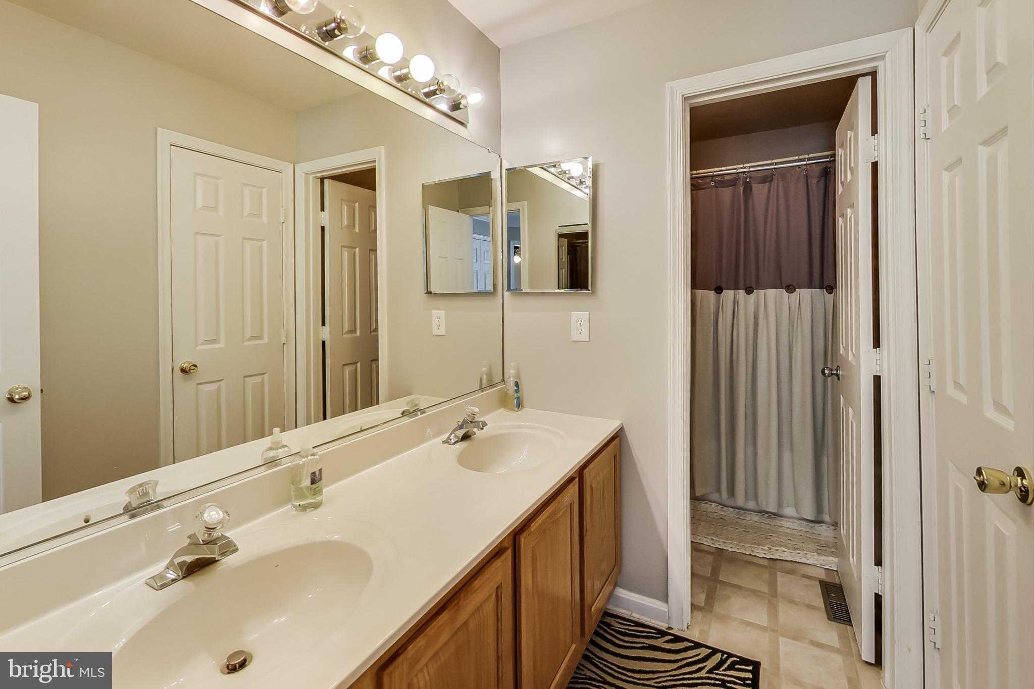2444 Rabbits Run Street Waldorf, MD 20601 - Photo 19 of 25 2nd Floor Hallway Bath