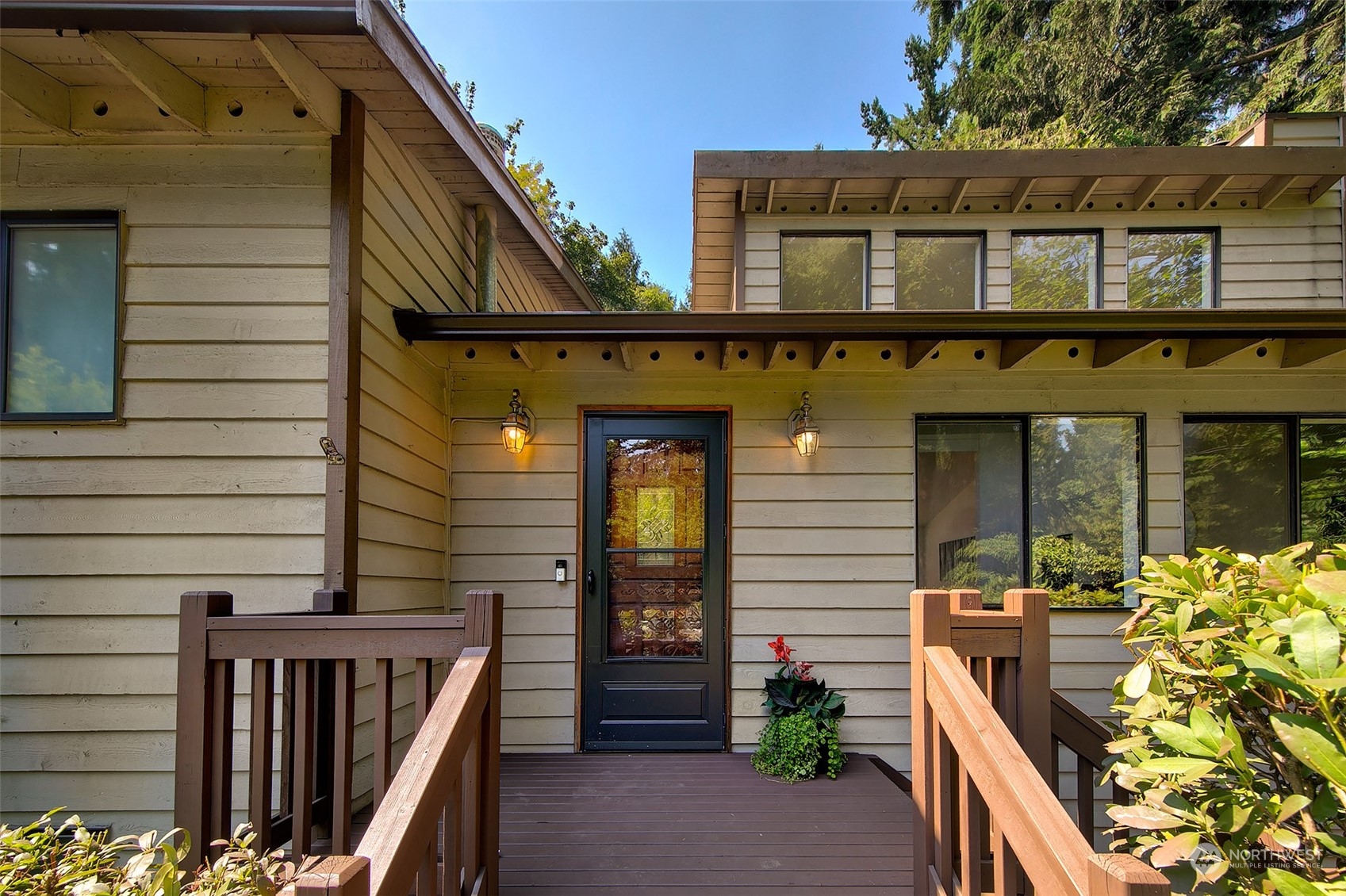 21822 4th Avenue Southeast Bothell, WA 98021 - Photo 1 of 1 a front view of a house with glass windows