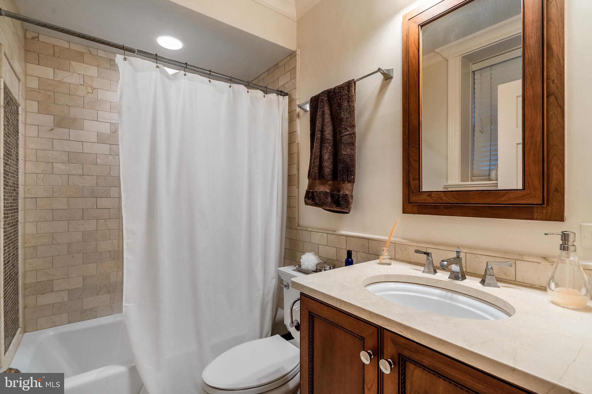4 Logan Circle Northwest, Unit 1 Washington, DC 20005 - Photo 13 of 15 En-suite bathroom with tub.