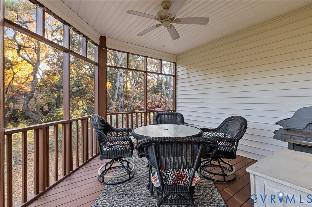 3973 West Stratford Road Virginia Beach, VA 23455 - Photo 18 of 45 a view of a balcony with furniture and a window