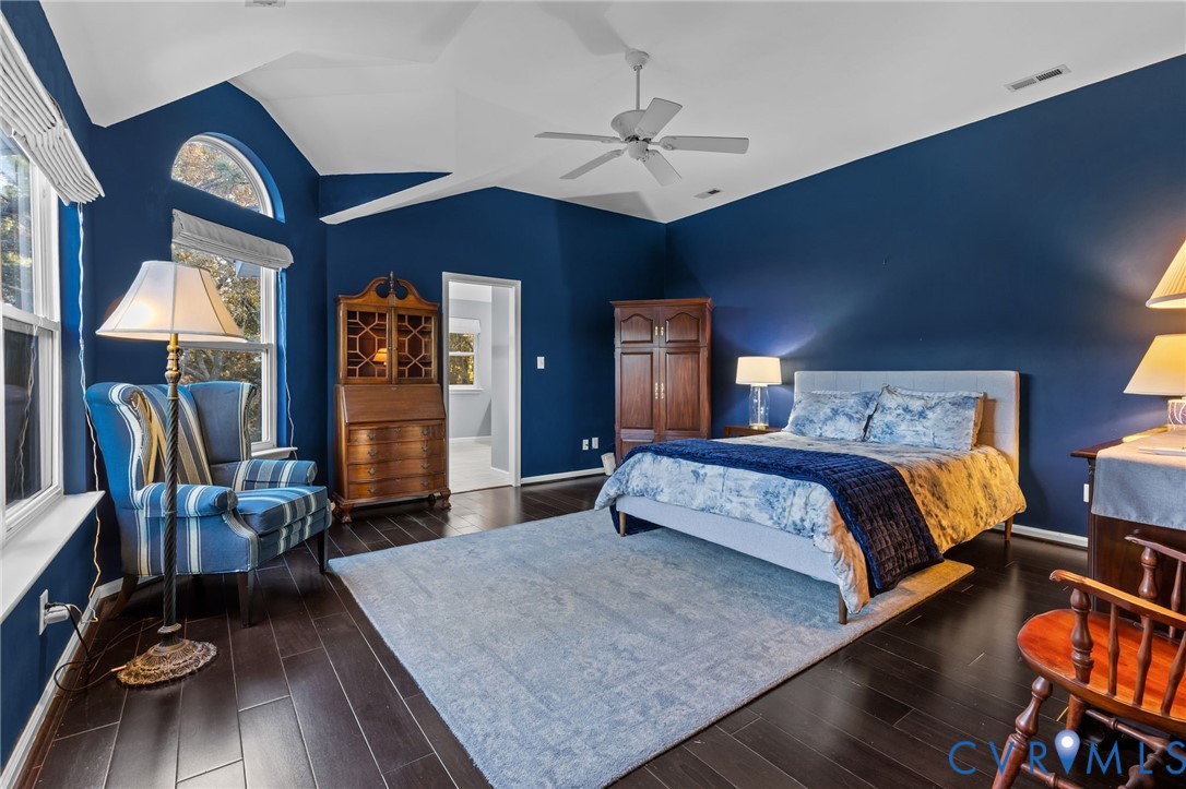 3973 West Stratford Road Virginia Beach, VA 23455 - Photo 21 of 45 a bedroom with a large bed a flat tv screen and dresser