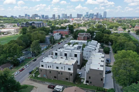 a view of city with tall buildings