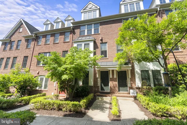 front view of a building next to a yard