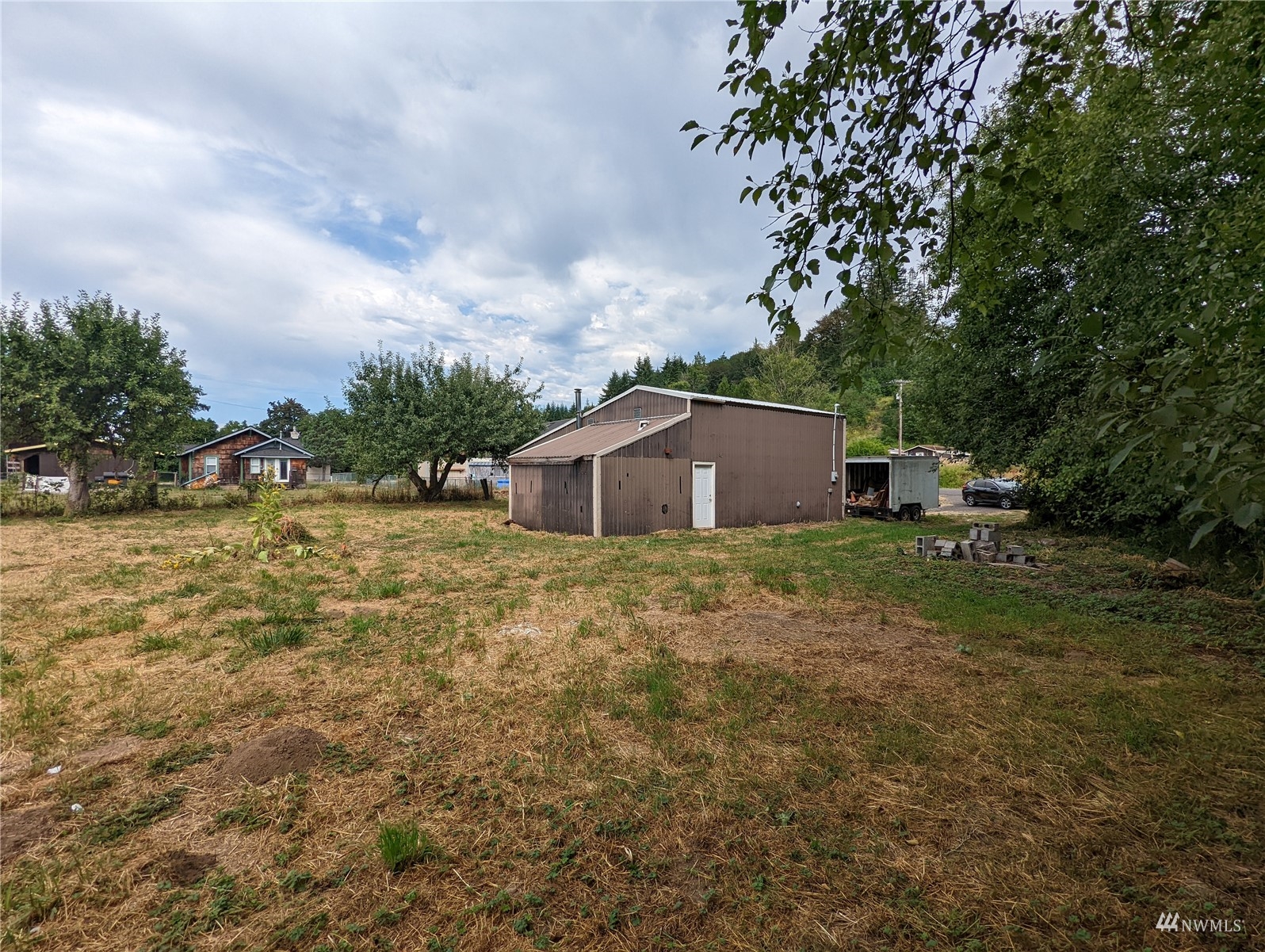 1214 Ferrier Road Winlock, WA 98596 - Photo 11 of 18 a backyard of a house with lots of green space