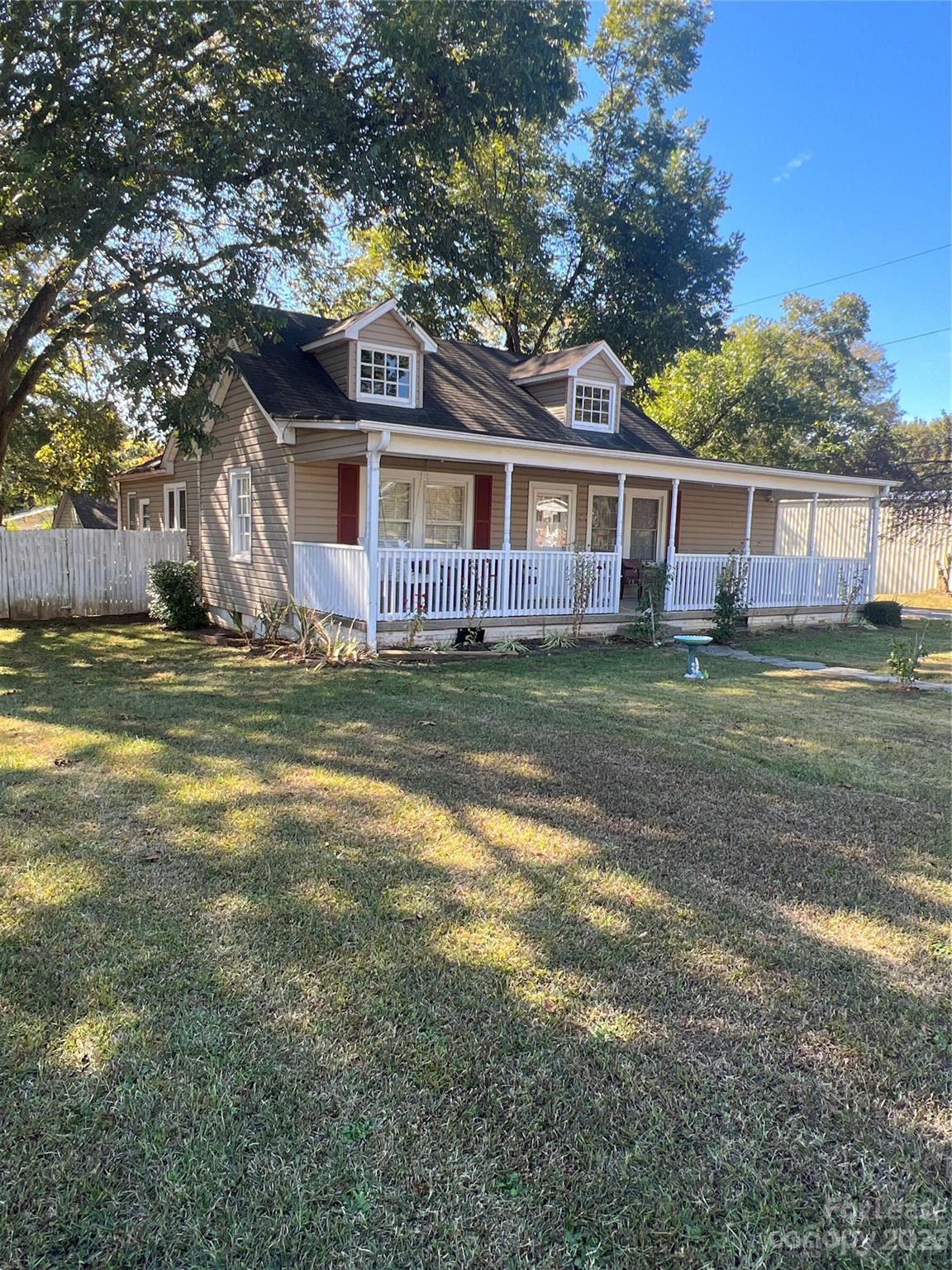 1710 King Road Shelby, NC 28150 - Photo 2 of 20 a view of a yard in front of a house with large trees