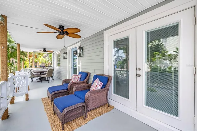 a balcony view with a outdoor seating