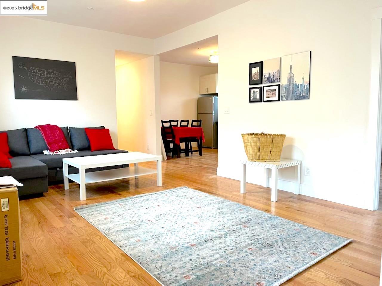 1628 Tyler Street Berkeley, CA 94703 - Photo 18 of 38 a living room with furniture and a rug