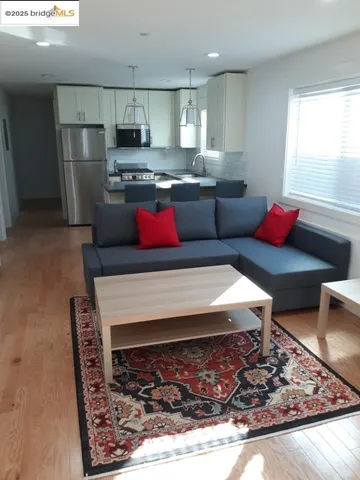 a living room with a couch and a table
