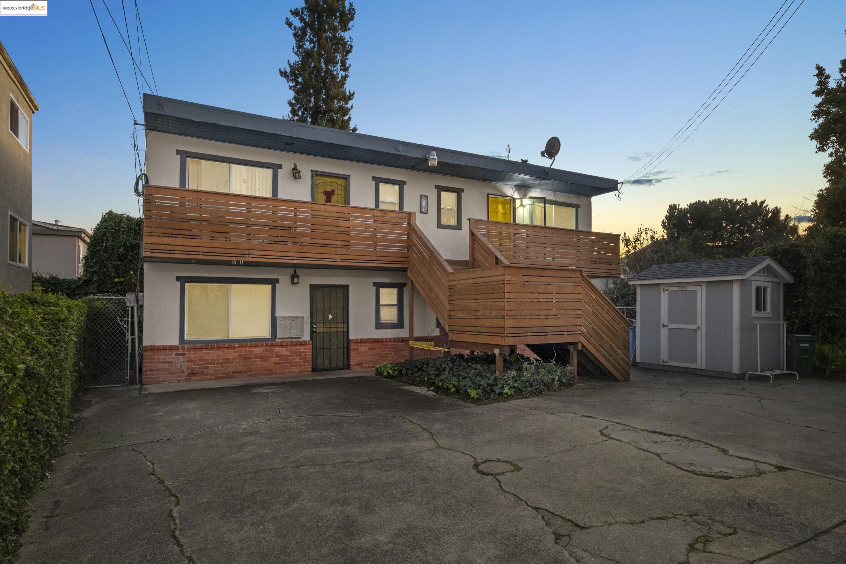 1628 Tyler Street Berkeley, CA 94703 - Photo 2 of 38 a front view of a house with a yard