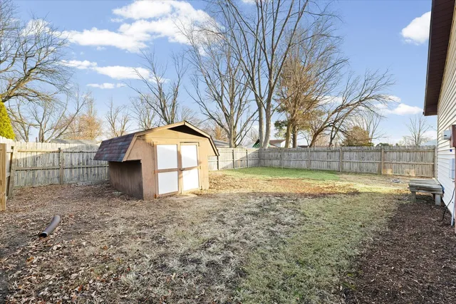 a view of backyard with outdoor space