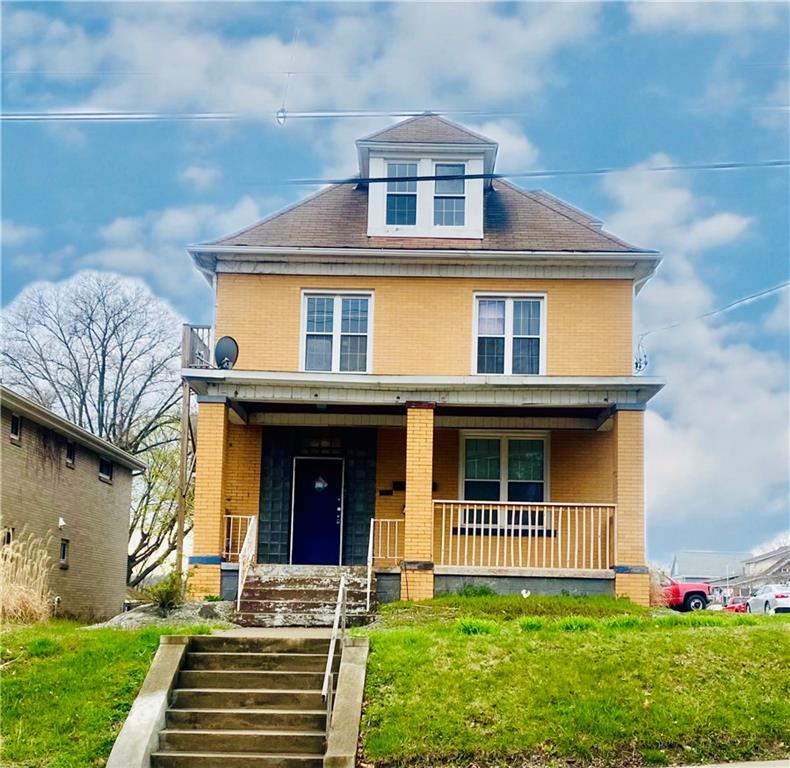 2602 Main Street Munhall, PA 15120 - Photo 1 of 21 a front view of a house with garden