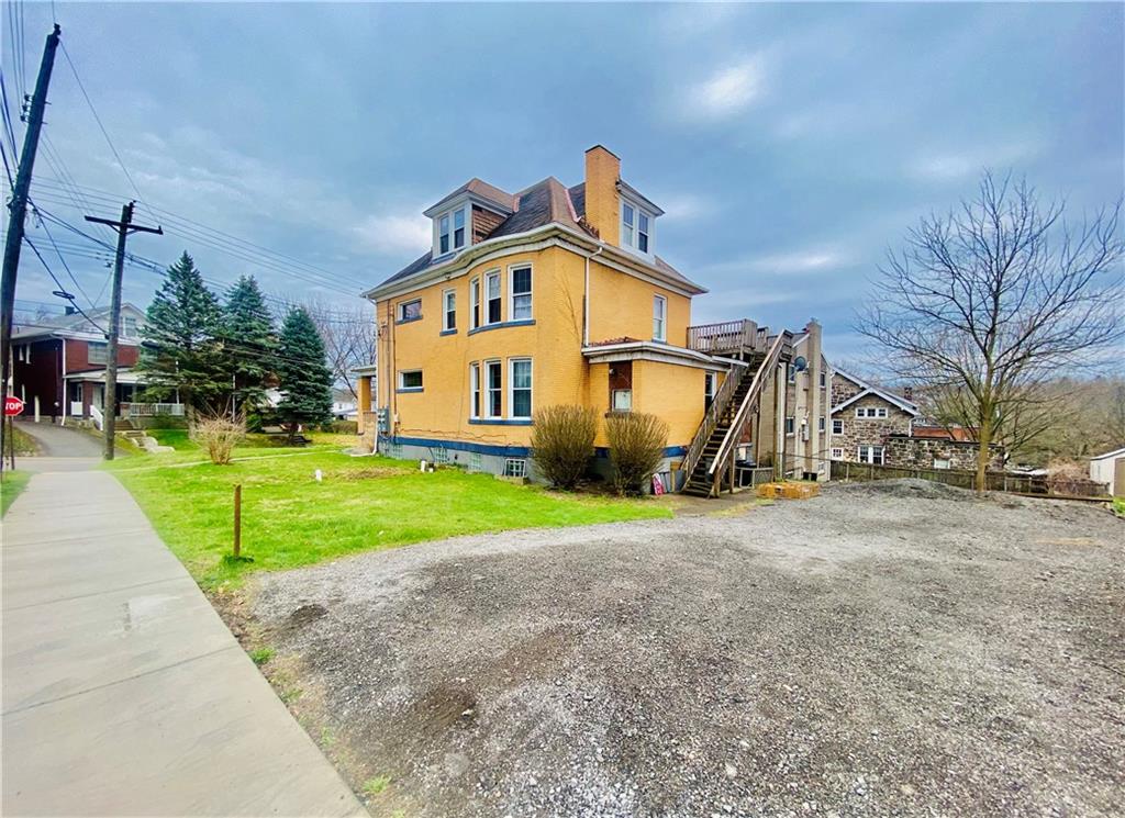 2602 Main Street Munhall, PA 15120 - Photo 21 of 21 a front view of a house with garden