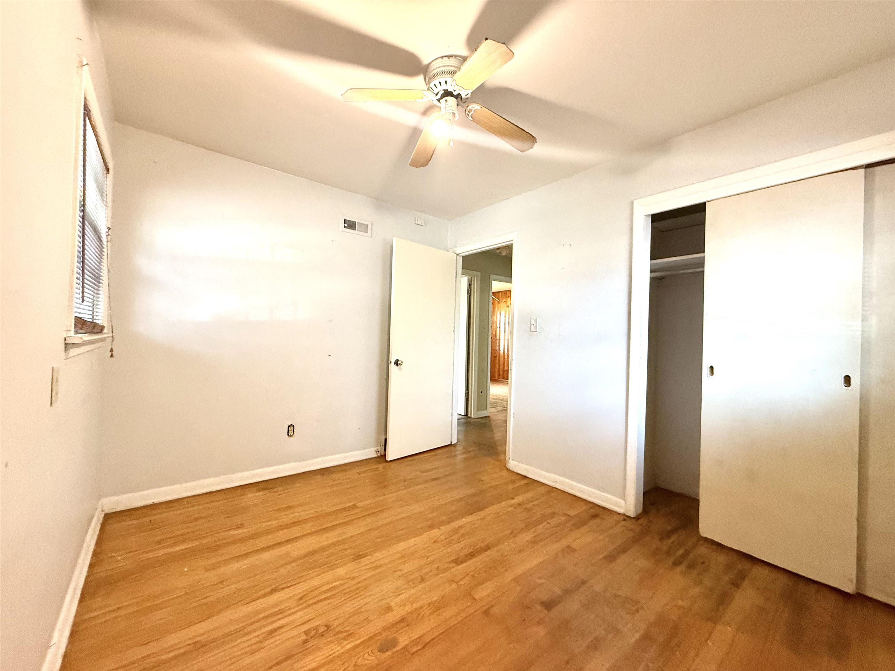 2930 Getwell Road Memphis, TN 38118 - Photo 13 of 25 Hardwood flooring complements the light-toned walls