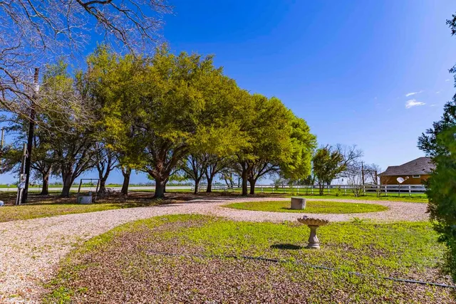 a building with trees in the background
