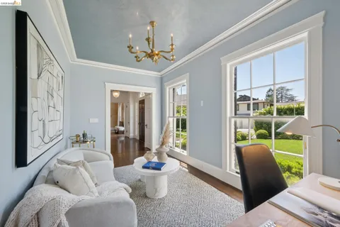 a bedroom with a bed and a fireplace