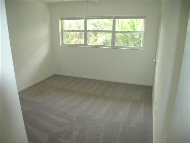 125 West Hidden Valley Boulevard, Unit 10 Boca Raton, FL 33487 - Photo 6 of 7 Bedroom 1