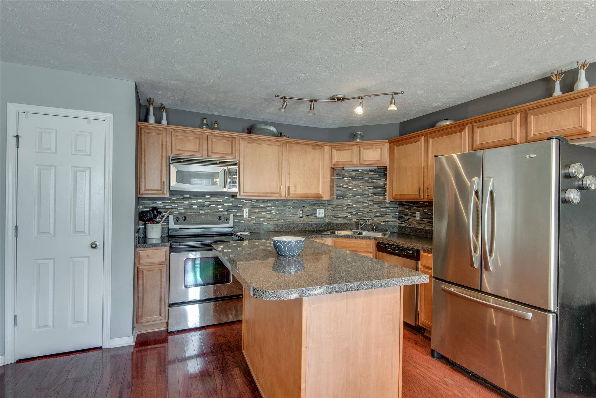 115 Antler Ridge Circle Nashville, TN 37214 - Photo 8 of 20 Custom backsplash and hardware, as well as a separate pantry.