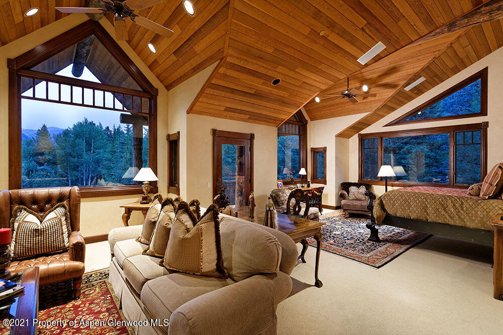 31 Northstar Circle Aspen, CO 81611 - Photo 25 of 51 a living room with furniture and a large window