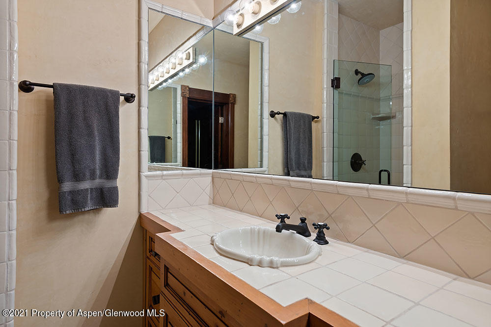 31 Northstar Circle Aspen, CO 81611 - Photo 41 of 51 a bathroom with a sink and a mirror