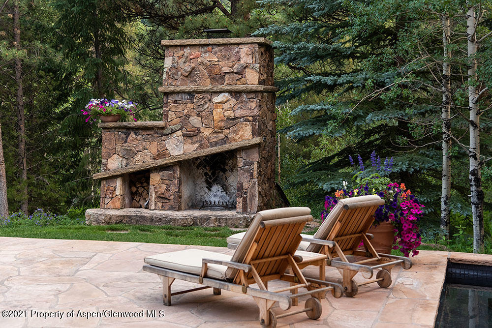 31 Northstar Circle Aspen, CO 81611 - Photo 48 of 51 a view of backyard with outdoor seating and trees