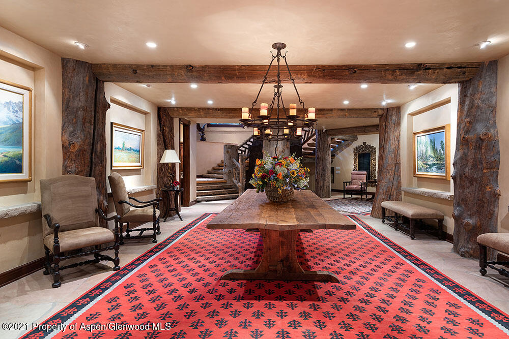 31 Northstar Circle Aspen, CO 81611 - Photo 7 of 51 a living room with furniture and a chandelier