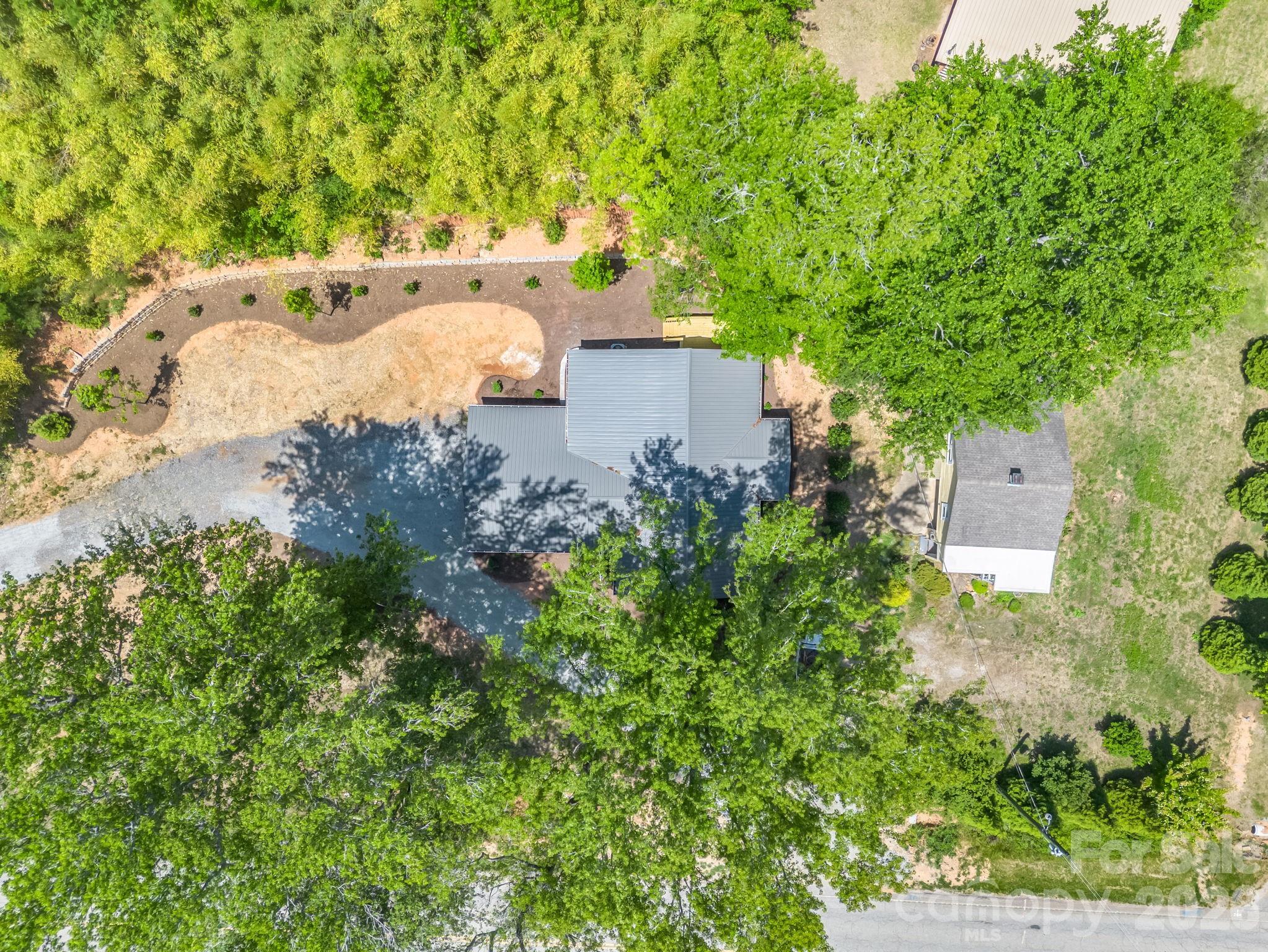 5923 Highway 14 Landrum, SC 29356 - Photo 15 of 15 an aerial view of a house with a yard and trees
