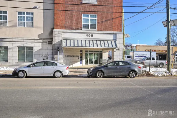 a car parked in front of a building