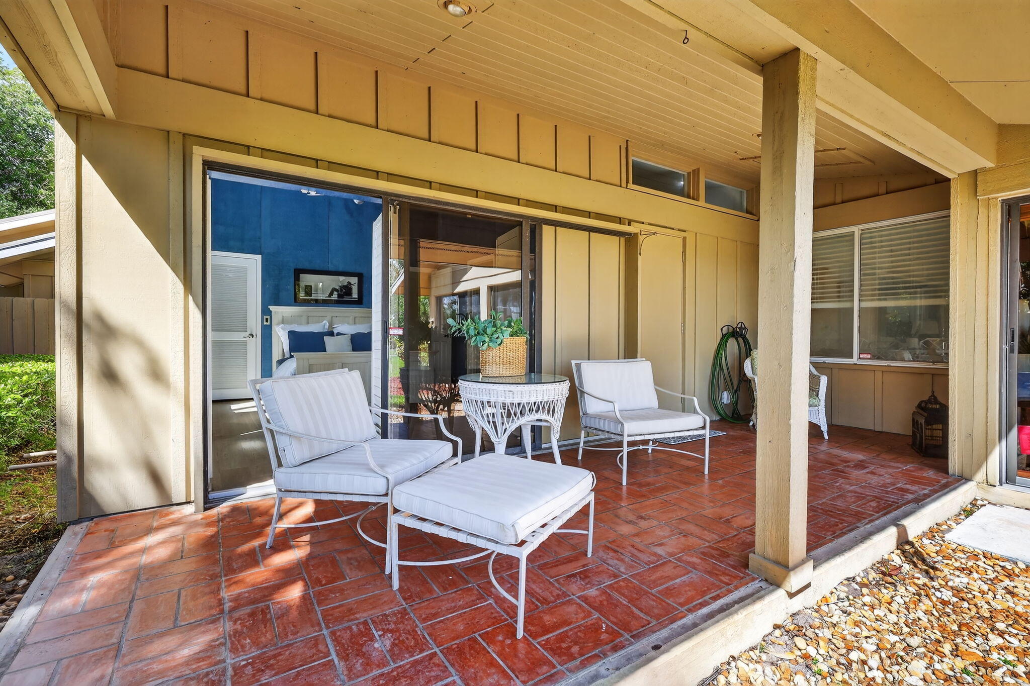 6151 Southeast Winged Foot Drive Stuart, FL 34997 - Photo 13 of 47 a outdoor space with a large window and sitting area