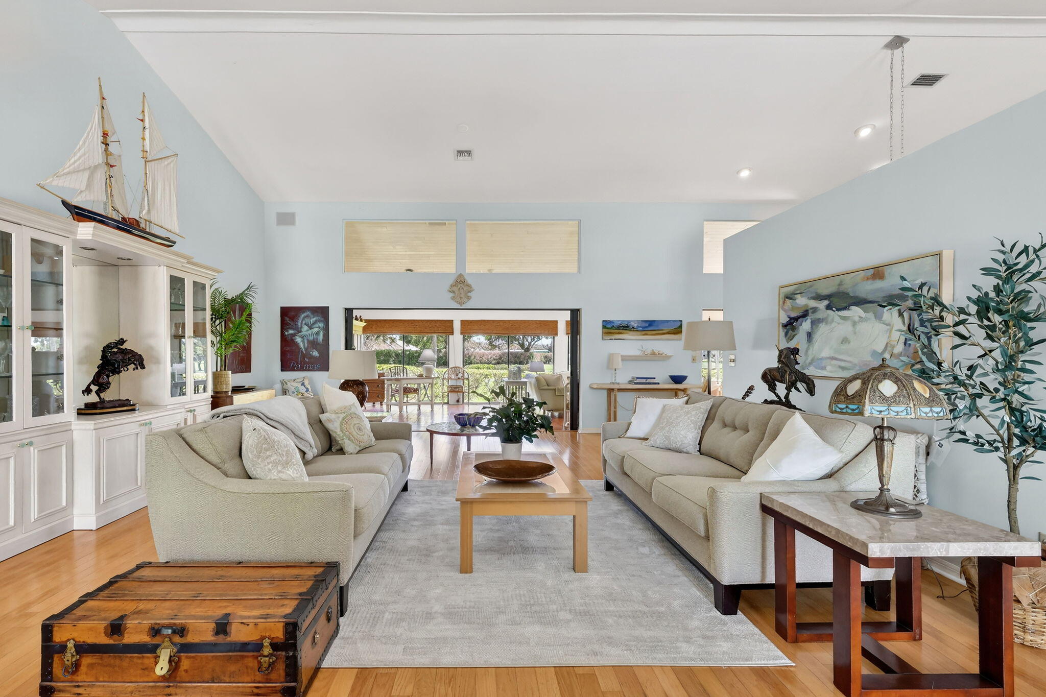 6151 Southeast Winged Foot Drive Stuart, FL 34997 - Photo 21 of 47 a living room with furniture and a large window