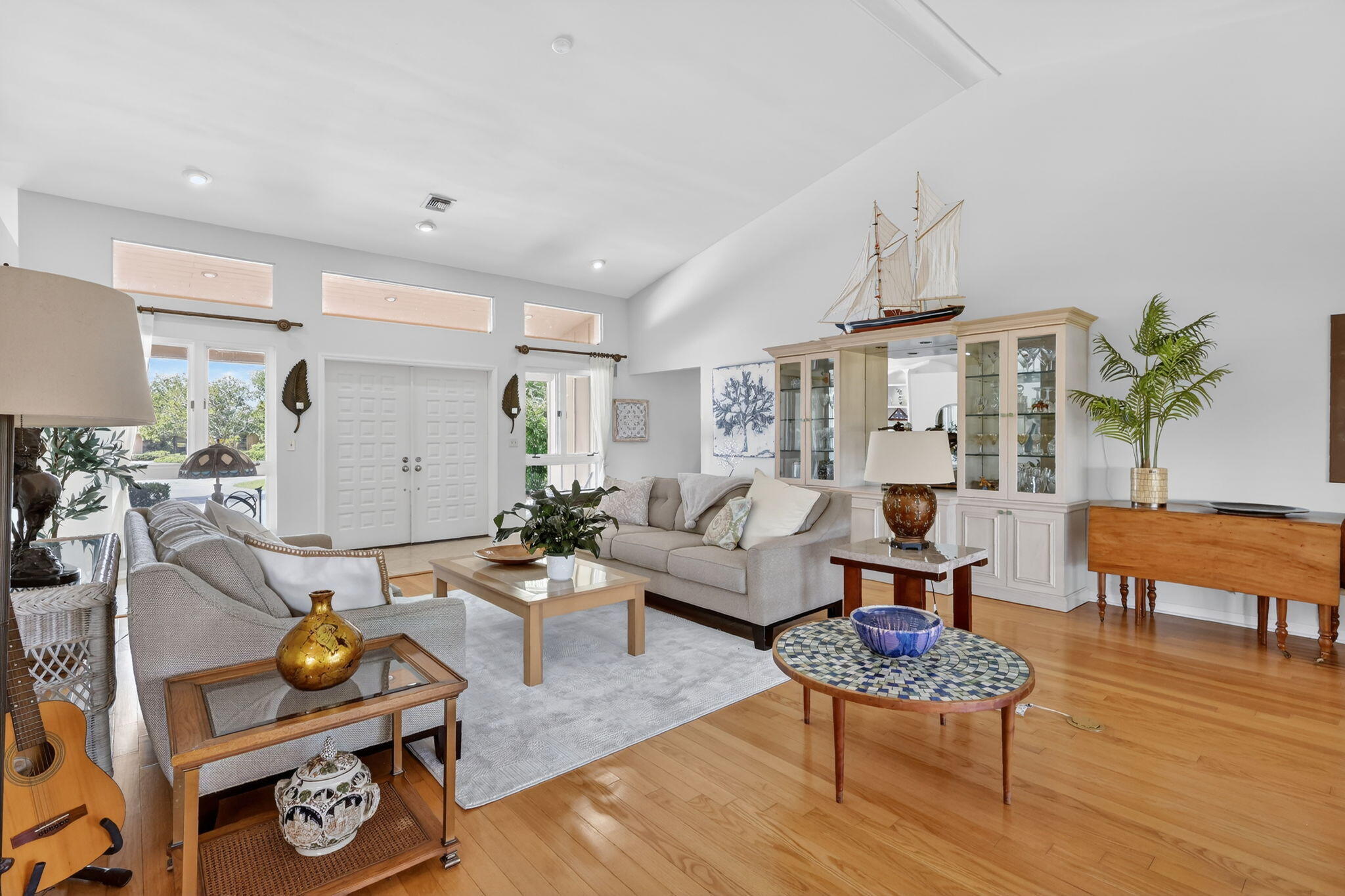 6151 Southeast Winged Foot Drive Stuart, FL 34997 - Photo 24 of 47 a living room with furniture and wooden floor