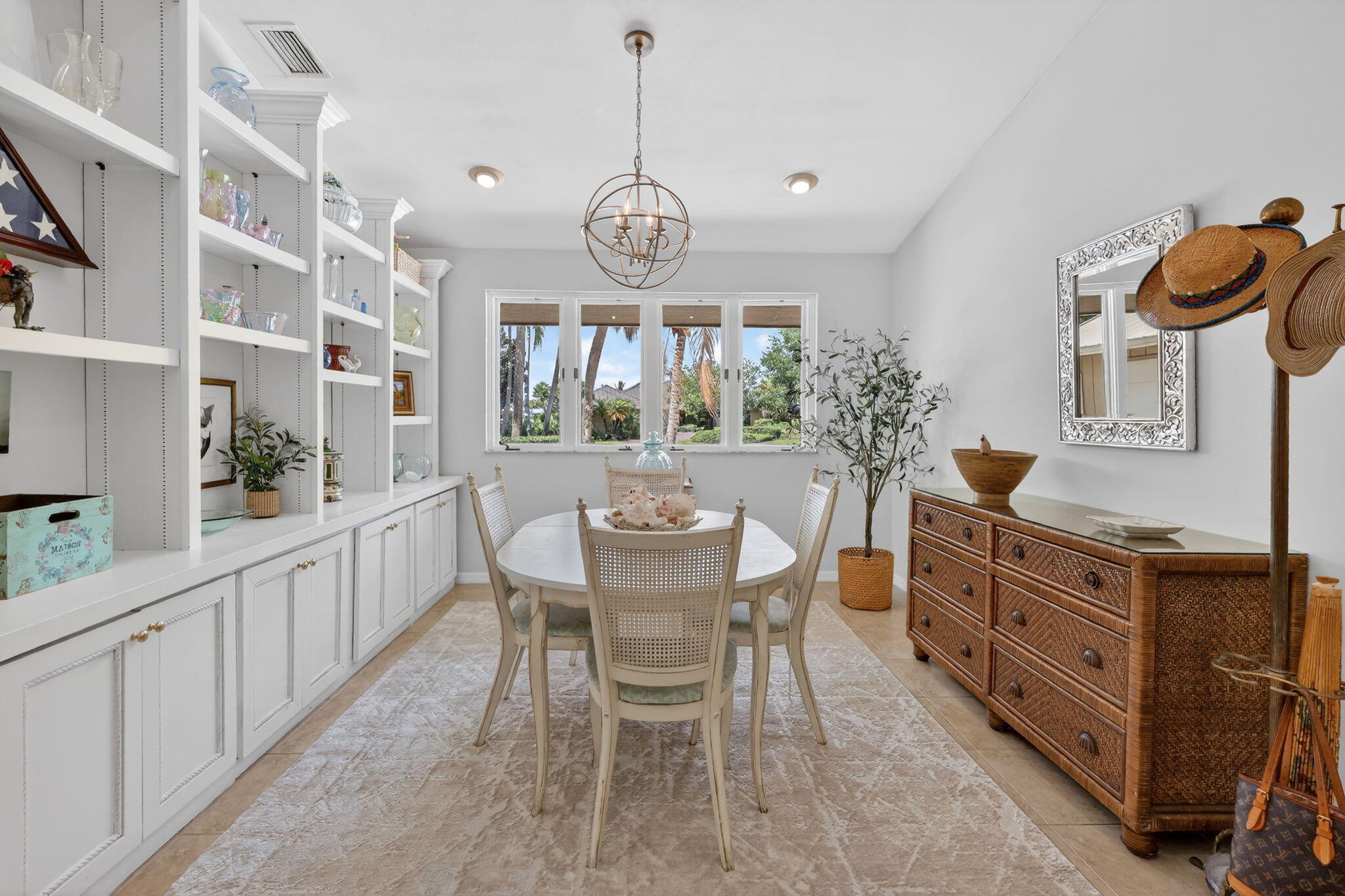 6151 Southeast Winged Foot Drive Stuart, FL 34997 - Photo 32 of 47 a view of a dining room with furniture