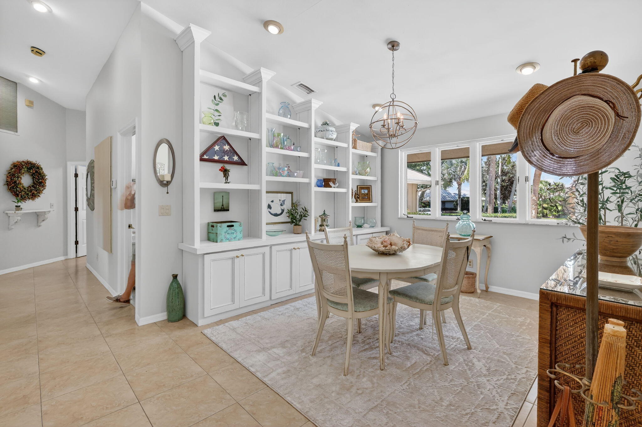 6151 Southeast Winged Foot Drive Stuart, FL 34997 - Photo 33 of 47 a dining room with furniture and window