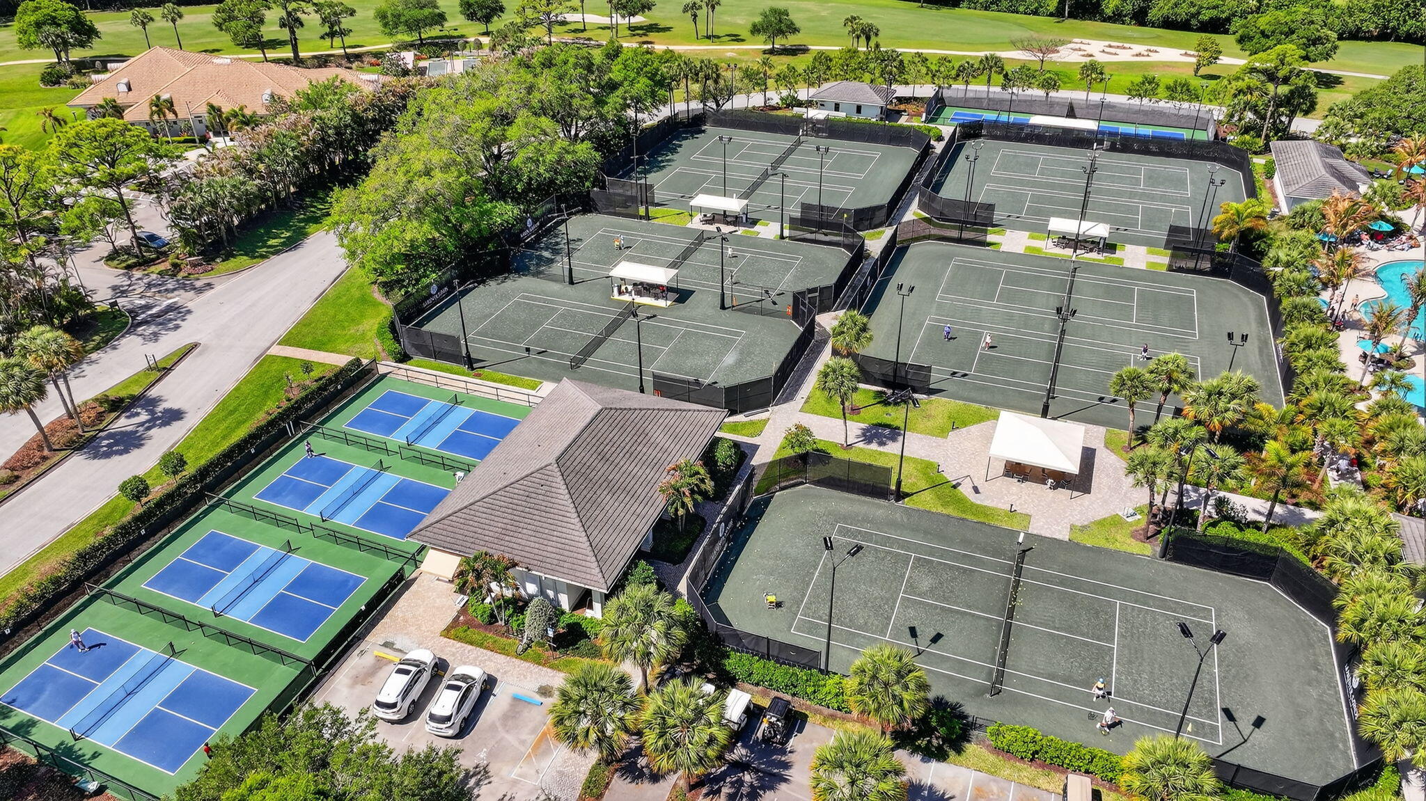 6151 Southeast Winged Foot Drive Stuart, FL 34997 - Photo 46 of 47 an aerial view of a houses with yard