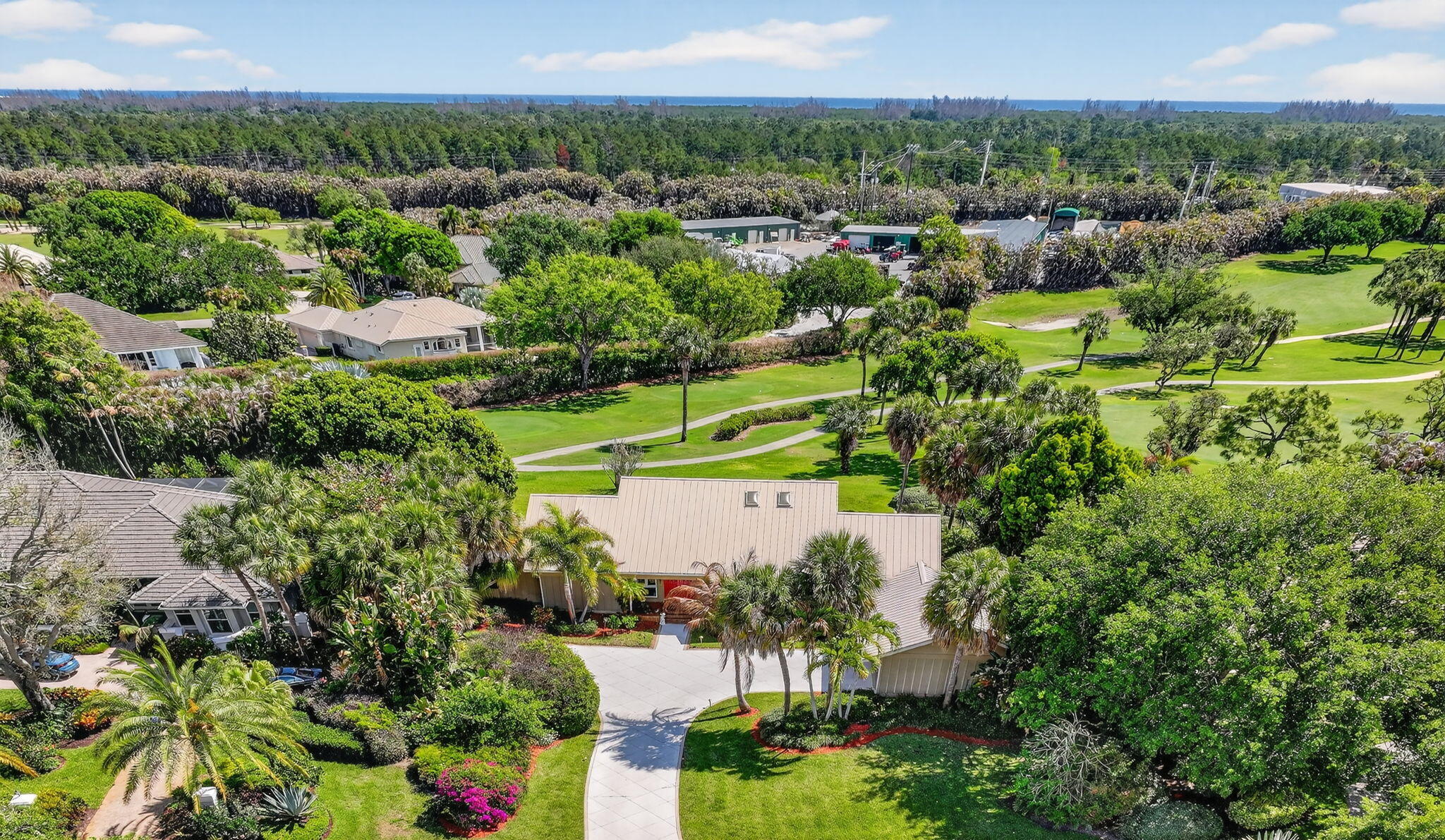 6151 Southeast Winged Foot Drive Stuart, FL 34997 - Photo 9 of 47 an aerial view of residential houses with outdoor space and trees all around