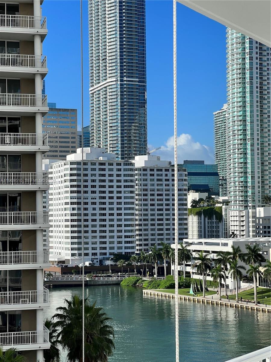 801 Brickell Key Boulevard, Unit 809 Miami, FL 33131 - Photo 16 of 17 a view of a lake from a balcony
