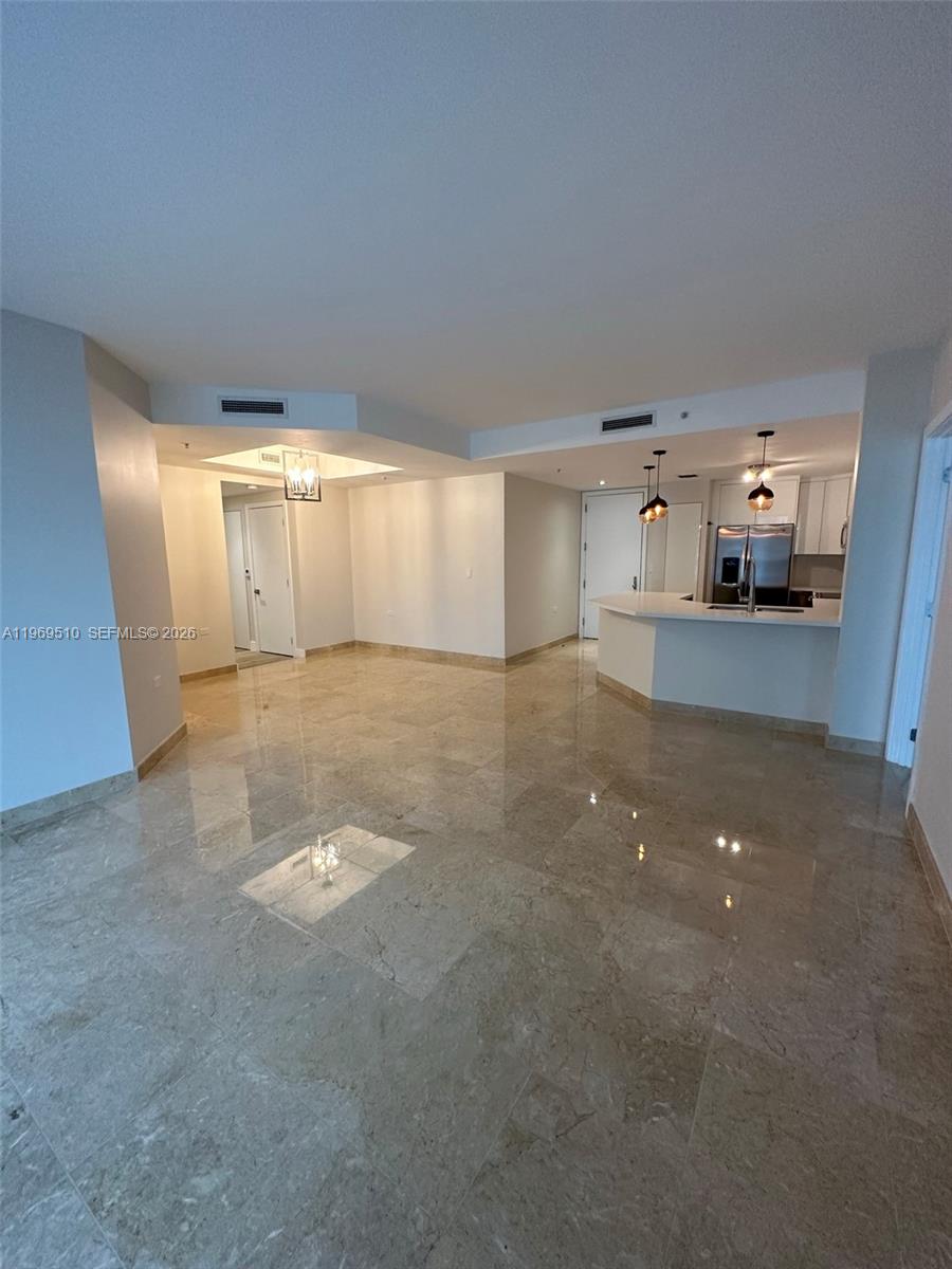801 Brickell Key Boulevard, Unit 809 Miami, FL 33131 - Photo 2 of 17 a view of a livingroom with an empty space