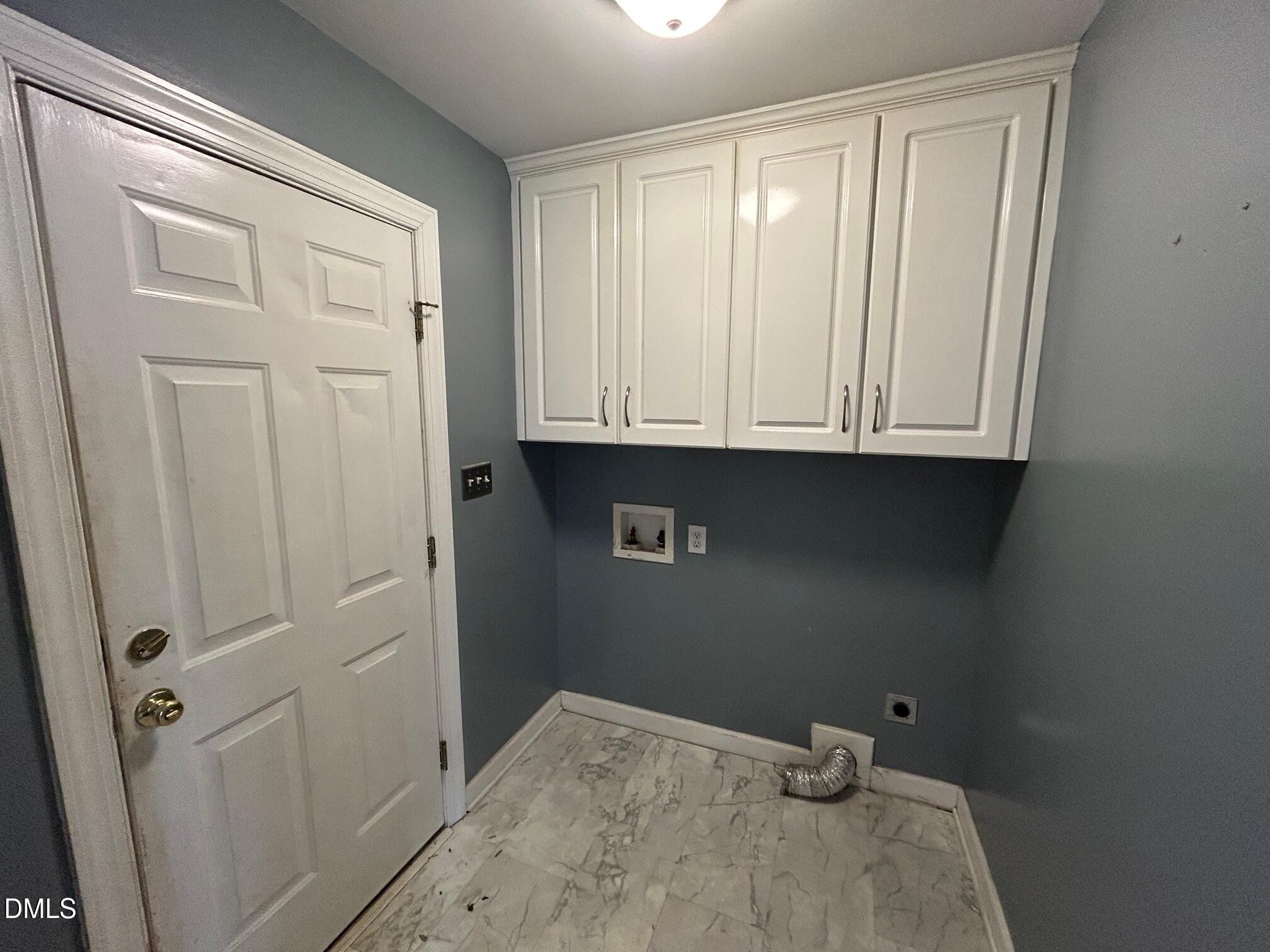 1220 Oxford Loop Road Oxford, NC 27565 - Photo 14 of 30 a view of small space with wooden floor and cabinet