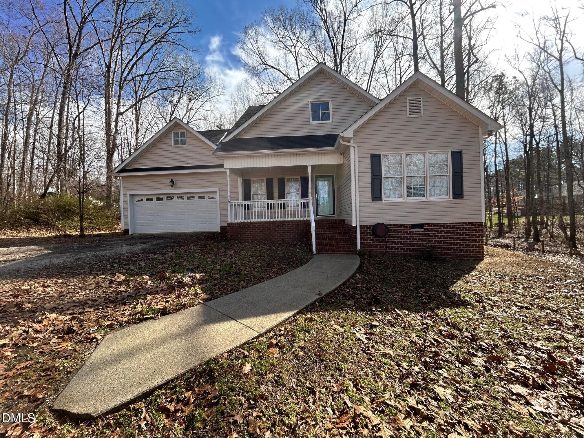 1220 Oxford Loop Road Oxford, NC 27565 - Photo 2 of 30 a front view of a house with a yard