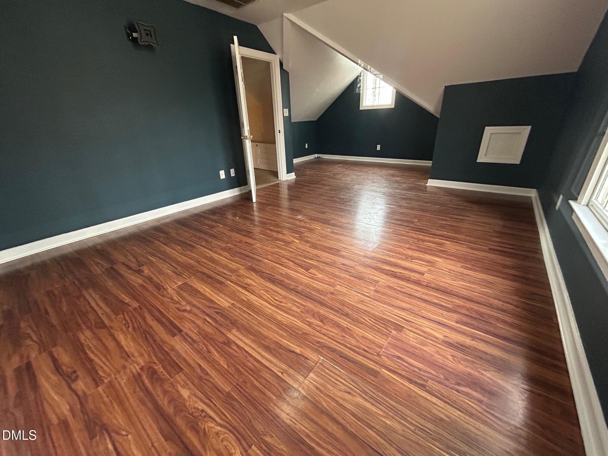 1220 Oxford Loop Road Oxford, NC 27565 - Photo 24 of 30 a view of empty room with wooden floor