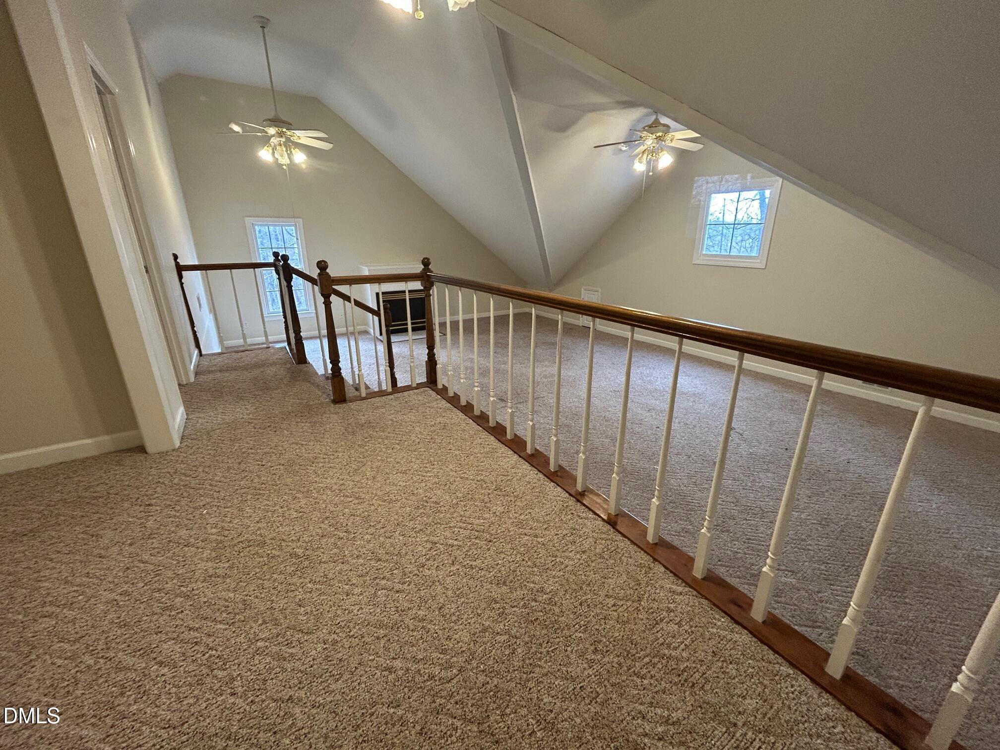 1220 Oxford Loop Road Oxford, NC 27565 - Photo 25 of 30 a view of staircase with lots of frames on wall and stairs
