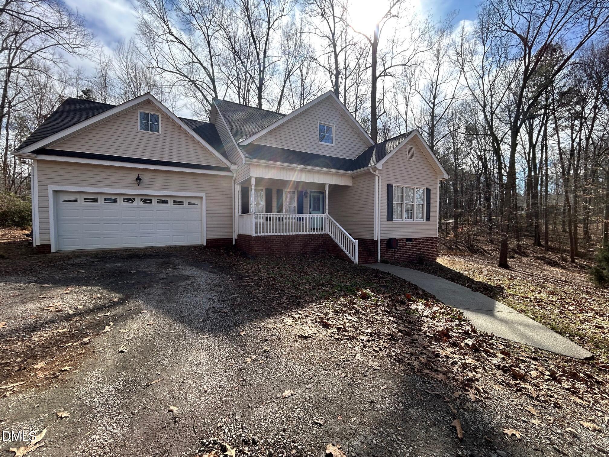 1220 Oxford Loop Road Oxford, NC 27565 - Photo 3 of 30 a front view of a house with a yard