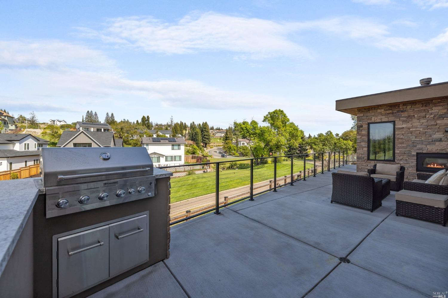 3754 St Andrews Drive Santa Rosa, CA 95403 - Photo 28 of 37 BBQ and deck area has undermount rail lighting, hot/cold water, built-in heaters.