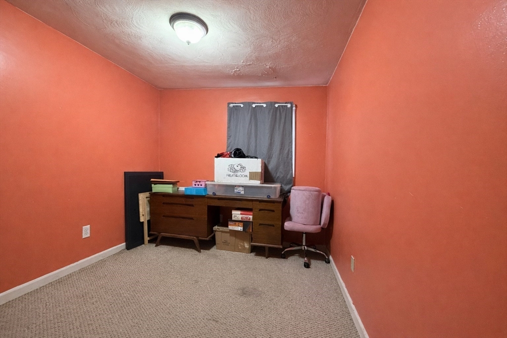133 Ardsley Circle Brockton, MA 02302 - Photo 11 of 16 a room with furniture