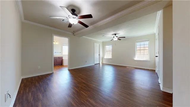 a view of storage and utility room with wooden floor