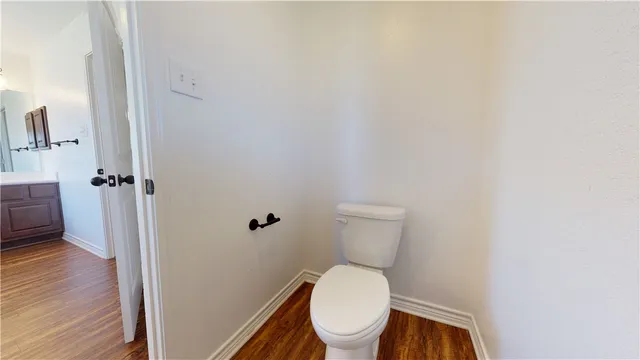 a spacious bathroom with a bathtub shower and a sink