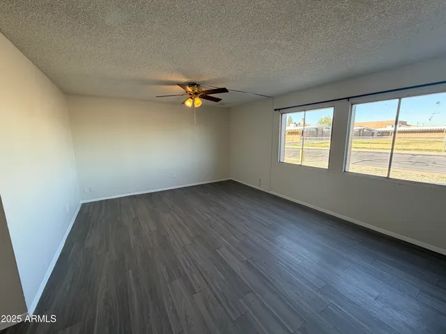 an empty room with windows