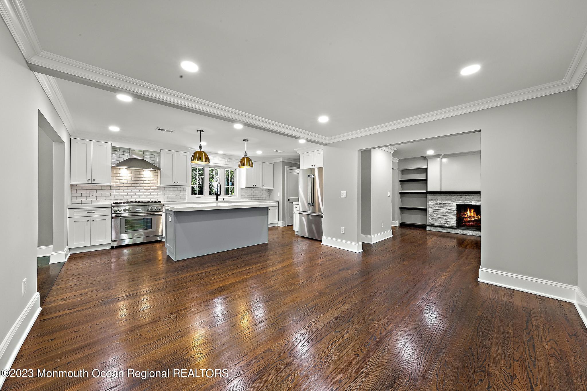 2 Heathcliff Road Rumson, NJ 07760 - Photo 18 of 38 a view of a kitchen with a sink and a stove top oven