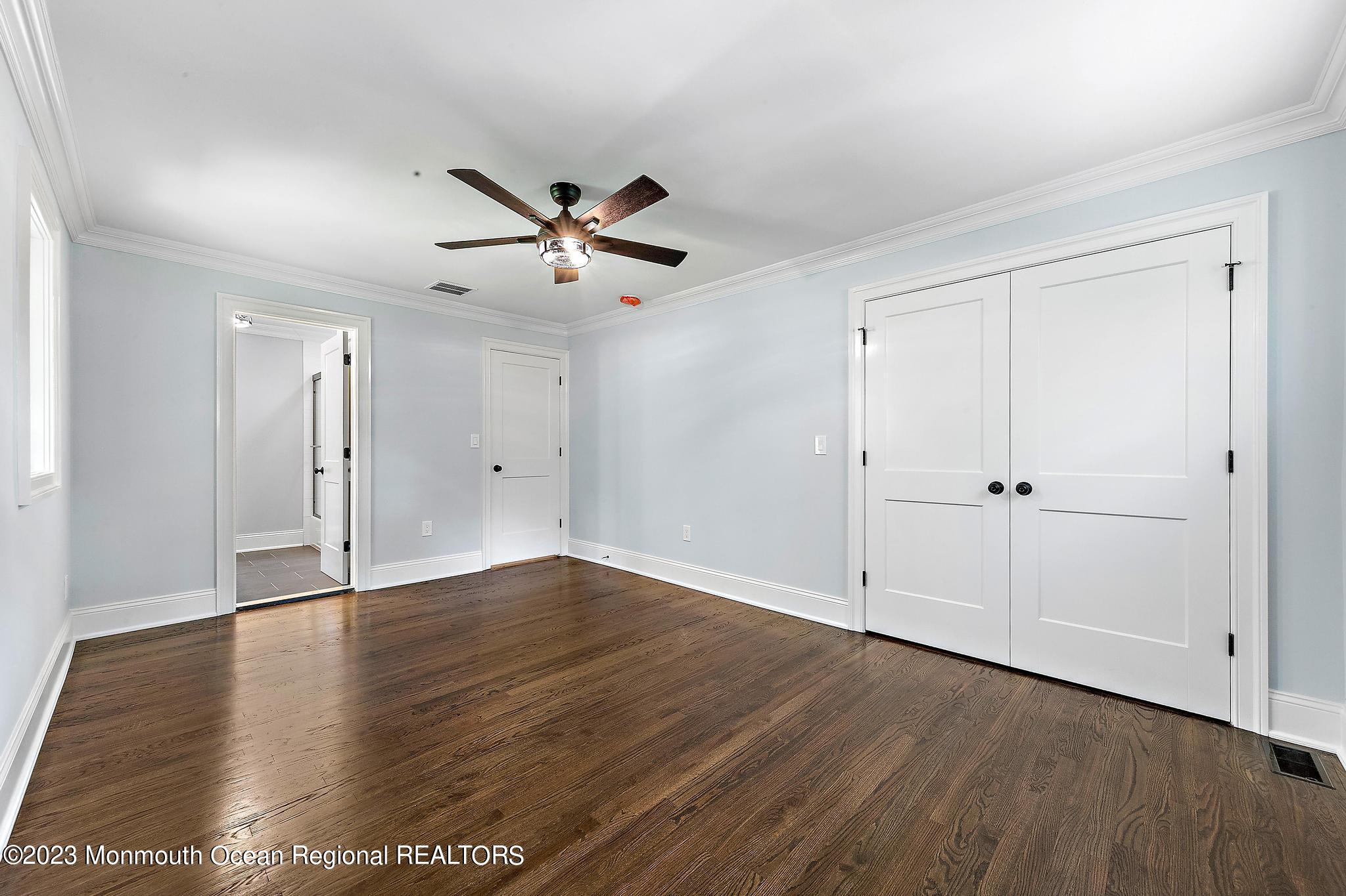 2 Heathcliff Road Rumson, NJ 07760 - Photo 27 of 38 a view of an empty room with wooden floor
