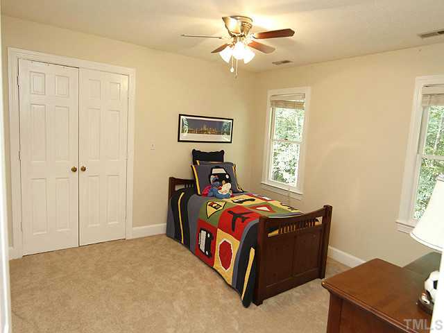 7908 Farnham Court Raleigh, NC 27615 - Photo 20 of 25 Second Floor Bedroom Offers New Carpet-Fan and Natural Light Flowing In